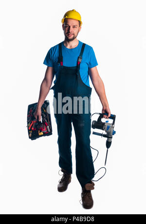 Handyman standing isolated on white in studio Stock Photo