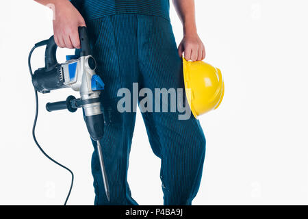 Handyman standing isolated on white in studio Stock Photo