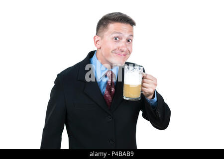 Portrait of a businessman with beer foam on his lips with a mug of beer in his hand, isolated on white background Stock Photo