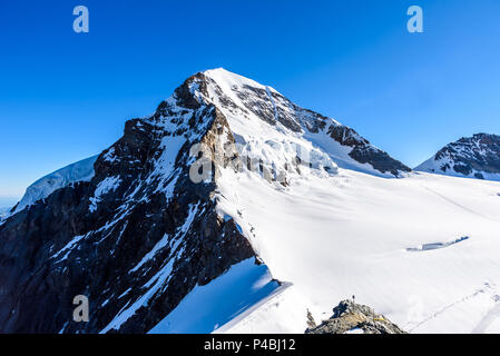 Moench mountain - View of the mountain Moench in the Bernese Alps in Switzerland - travel destination in Europe Stock Photo
