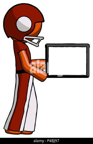 Orange football player man show tablet device computer to viewer, blank area. Stock Photo