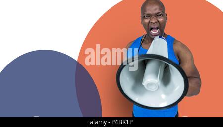 Trainer screaming with megaphone on orange and purple background Stock Photo