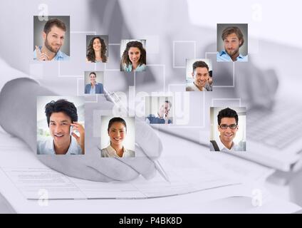 Composite image of businessperson writing with portraits picture Stock Photo