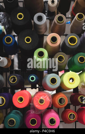 Multicolored threads arranged in row Stock Photo