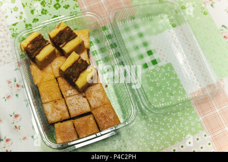 Details of homemade cakes in plastic transparent package. Stock Photo