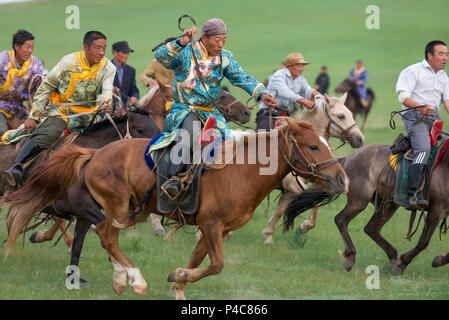 Young horsemen demonstrate team riding, Zhenglanqi Wuyi Farm, Inner Mongolia, China, Inner Mongolia, China Stock Photo