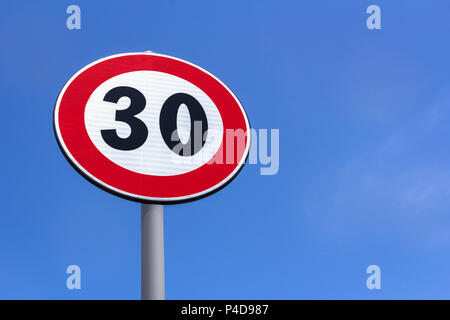 Road sign 30 Km speed limit .Traffic Limitation Order, Red Circle. Space for text. Stock Photo