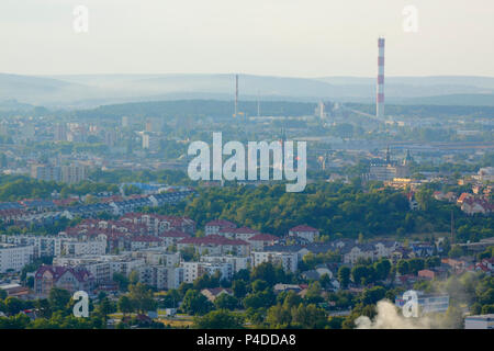 Hazy cityscape before dusk. Poland, Kielce, The Holy Cross Mountains. Stock Photo