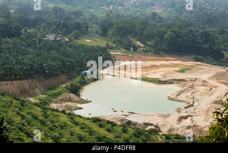 Aerial view of sand quarry and tailing ponds. Stock Photo