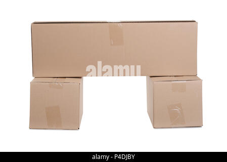 cardboard boxes stacked on white background Stock Photo