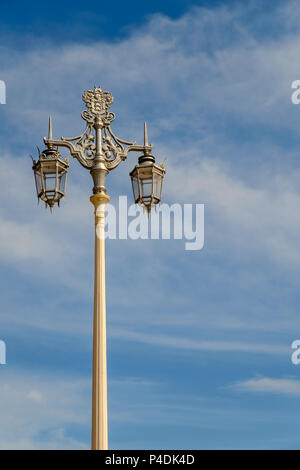 Ornate street lamp on the seafront in the city of Brighton, East Sussex, England, UK in portrait orientation. Stock Photo