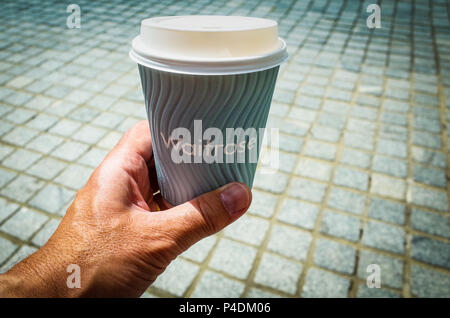A Waitrose Complementary Coffee Cup - the cups are being phased out, customers will need reusable cups in future Stock Photo
