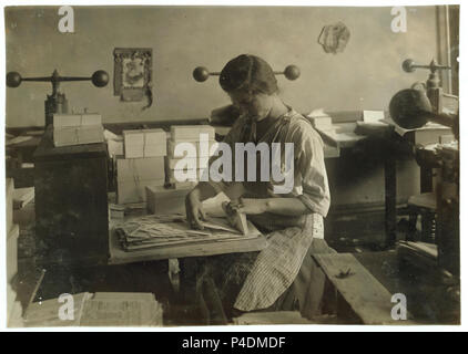 15-year old girl at her old job packing the finished envelopes. Embossing shop of Harry C. Taylor, 61 Court Street. LOC nclc.05166. Stock Photo