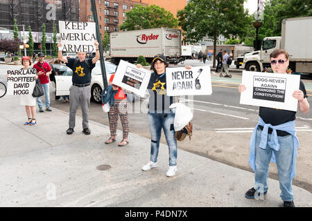 Protesters outside the Barnes & Noble book store where David Hogg, recent graduate of  Marjory Stoneman Douglas High School in Parkland, Florida and Lauren Hogg, co-author with David of #NeverAgain: A New Generation Draws the Line, are doing a book signing at the Barnes & Noble book store in Union Square. Stock Photo