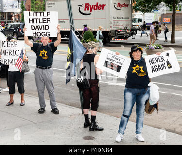 Protesters outside the Barnes & Noble book store where David Hogg, recent graduate of  Marjory Stoneman Douglas High School in Parkland, Florida and Lauren Hogg, co-author with David of #NeverAgain: A New Generation Draws the Line, are doing a book signing at the Barnes & Noble book store in Union Square. Stock Photo