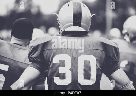 Toned image of an American Football player in action Stock Photo
