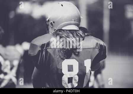 Toned image of an American Football player in action Stock Photo