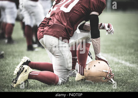 Toned image of an American Football player in action Stock Photo