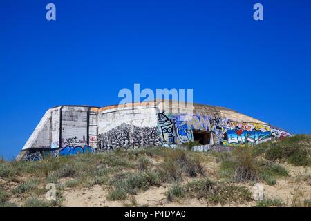 Beach bunkers with graffiti Cap Ferret France June 2018 Stock Photo