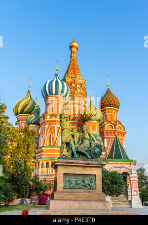 Monument to Minin and Pozharsky and St. Basil Cathedral in Moscow, Russia Stock Photo