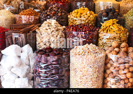Spices and herbs being sold on street stall at arab traditional market. Close up Stock Photo