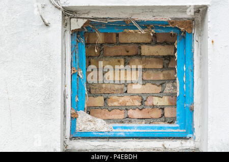 Bricked up window space. Possible for 'Watch this Space', 'Hole in the Wall' concepts, 'See an Opening', blocked view, closed world view, walled off. Stock Photo