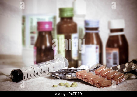 Different multi Pills and tablets isolated on white background. Pharmacy theme. The background image is the concept of medicine bottles, medication an Stock Photo