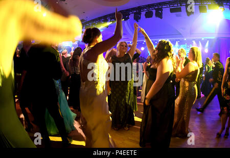 Guests participate in dancing during the 243rd Army Birthday Ball at the Washington Hilton Hotel in Washington, D.C., June 16, 2018.  (U.S. Army photo by Monica King)) Stock Photo