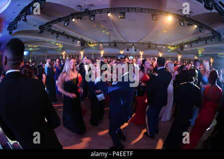 Guests participate in dancing during the 243rd Army Birthday Ball at the Washington Hilton Hotel in Washington, D.C., June 16, 2018.  (U.S. Army photo by Monica King) Stock Photo