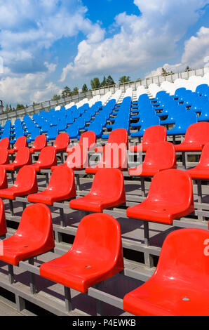 Plastic seats on stadium Stock Photo