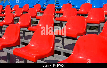 Plastic seats on stadium Stock Photo