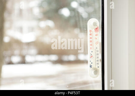 outdoor thermometer behind the window Stock Photo - Alamy