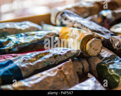 close up of used oil paint tubes Stock Photo