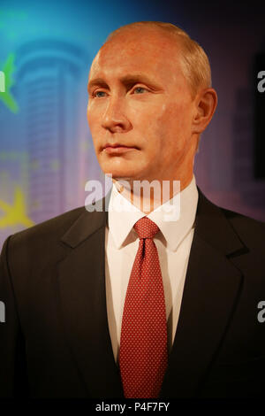 BANGKOK, THAILAND - DECEMBER 21, 2017: A waxwork of Vladimir Putin,President of the Russian Federation with red necktie and black suite is displaying  Stock Photo