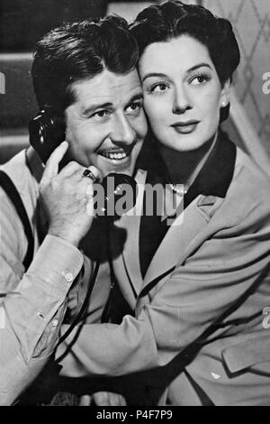 Original Film Title: THE FEMININE TOUCH.  English Title: THE FEMININE TOUCH.  Film Director: W. S. VAN DYKE.  Year: 1941.  Stars: DON AMECHE; ROSALIND RUSSELL. Credit: M.G.M. / Album Stock Photo