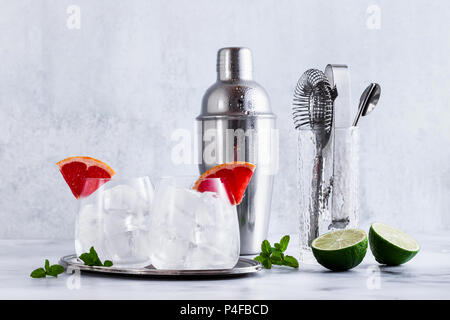 bar accessories on the table and two glasses of ice. tools for the restaurant Stock Photo