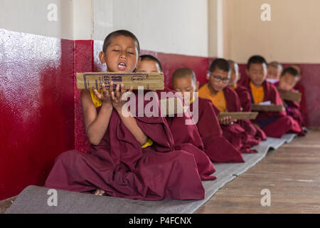 Gangtok, India - May 3, 2017: Lesson for novice monks in buddhist Tsuglakhang monastery in Gangtok, India Stock Photo