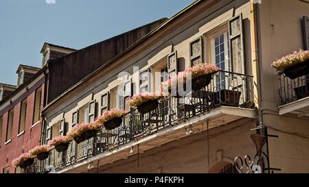 New Orleans, LA USA - May 9, 2018  -  Old French Quarter Buildings with Balcony & Plants #6 Stock Photo