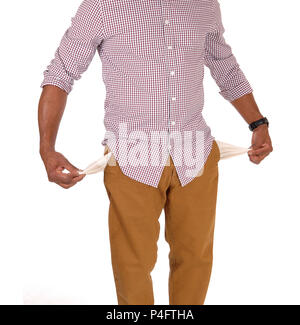 A closeup image of the middle part of his body showing the empty pockets he is a very poor man, isolated for white background Stock Photo