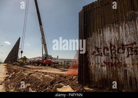 A new bigger fence is erected along the US Mexican border at Calexico ...