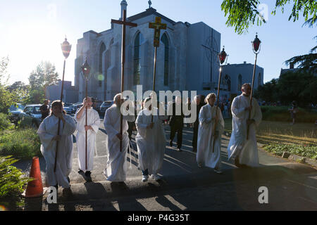 Priest leads procession of children about to have their first communion ...