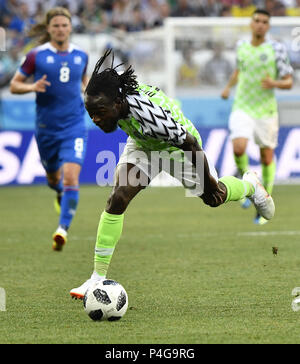 Volgograd, Russia. 22nd June, 2018. Victor Moses (front) of Nigeria competes during the 2018 FIFA World Cup Group D match between Nigeria and Iceland in Volgograd, Russia, June 22, 2018. Credit: He Canling/Xinhua/Alamy Live News Stock Photo