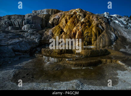 Wyoming, USA. 27th Aug, 2013. Mammoth Hot Springs, a large complex of hot springs on a hill of travertine, explodes in color within Yellowstone National Park. Credit: L.E. Baskow/ZUMA Wire/Alamy Live News Stock Photo