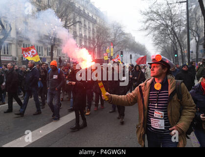 March 22, 2018 - Paris, France: French rail workers and civil servants take part in a street protest against president Emmanuel Macron's labour reform plans. Hundreds of thousands of workers rallied across the country to defend their rights on a date, March 22, that echoes the start of student protests in 1968. Manifestation de cheminots. Stock Photo