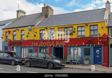 Brightly painted bar in Ireland advertising live music. The Oyster Bar on the main street in Dunfanaghy, County Donegal. Stock Photo