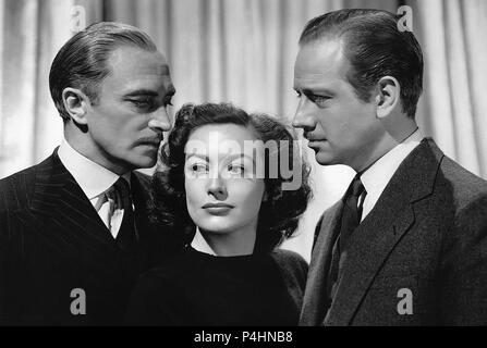 Original Film Title: A WOMAN'S FACE.  English Title: A WOMAN'S FACE.  Film Director: GEORGE CUKOR.  Year: 1941.  Stars: CONRAD VEIDT; MELVYN DOUGLAS; JOAN CRAWFORD. Credit: M.G.M. / Album Stock Photo