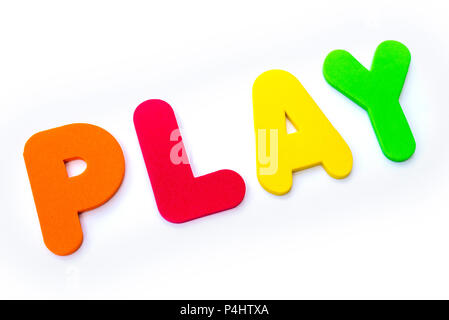 The word PLAY spelt in multi-coloured letters. Stock Photo