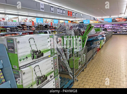 The Middle Aisle at Lidl, pop out for some spuds & come home with a lawnmower and some fishing waders, Latchford, Warrington, Cheshire, England Stock Photo