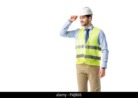 Smiling builder in reflective vest wearing helmet isolated on white Stock Photo