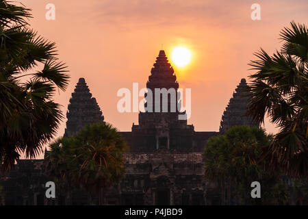 Angkor Wat temple in Siem Reap in Cambodia at sunrise. Angkor Wat is the largest religious monument in the world. Stock Photo
